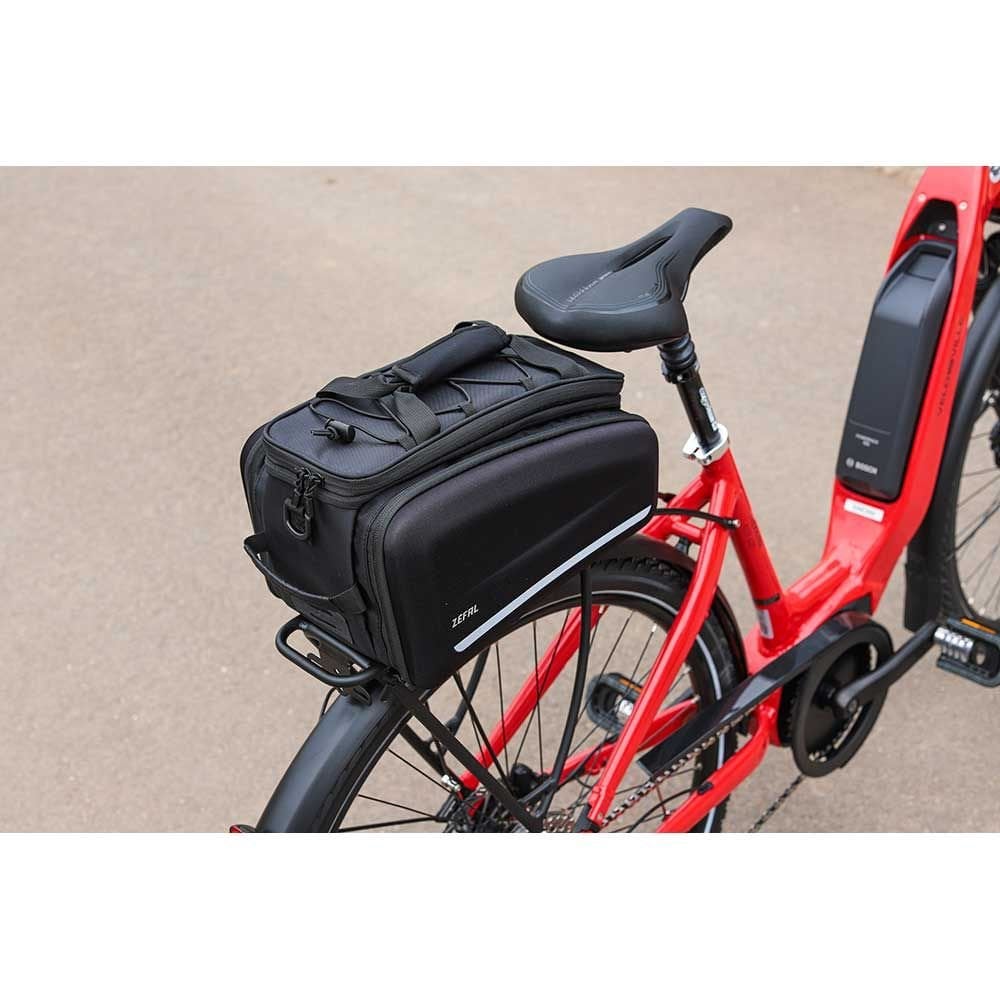Zefal Z Traveller 80 bike rack bag with 32L water-resistant pannier, shown mounted on a bike rack for cycling accessories.