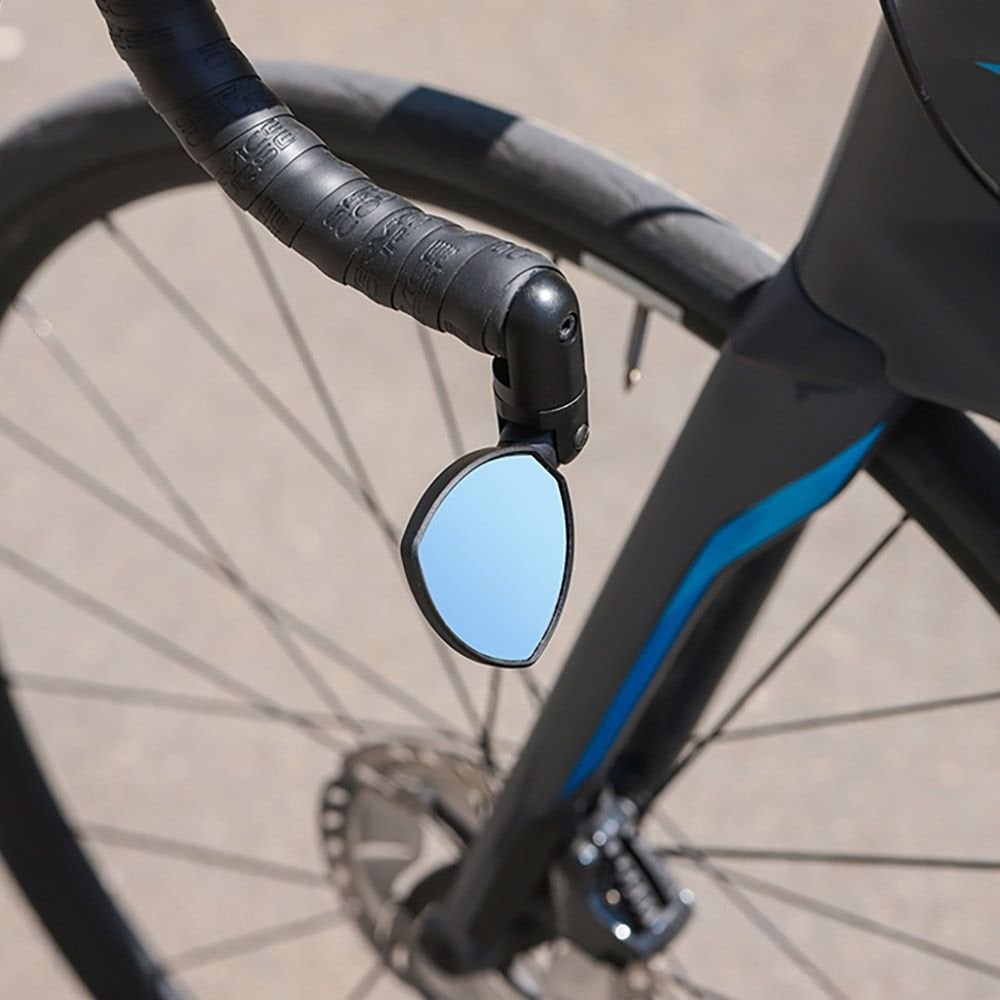 Zefal Spin 25 road bike mirror for drop handlebars, adjustable and foldable bike accessory with reflective surface.