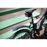 Zefal Mountain Guards Deflector RM60+ rear mudguard on mountain bike wheel, suitable for 26", 27.5", and 29" MTB bikes.