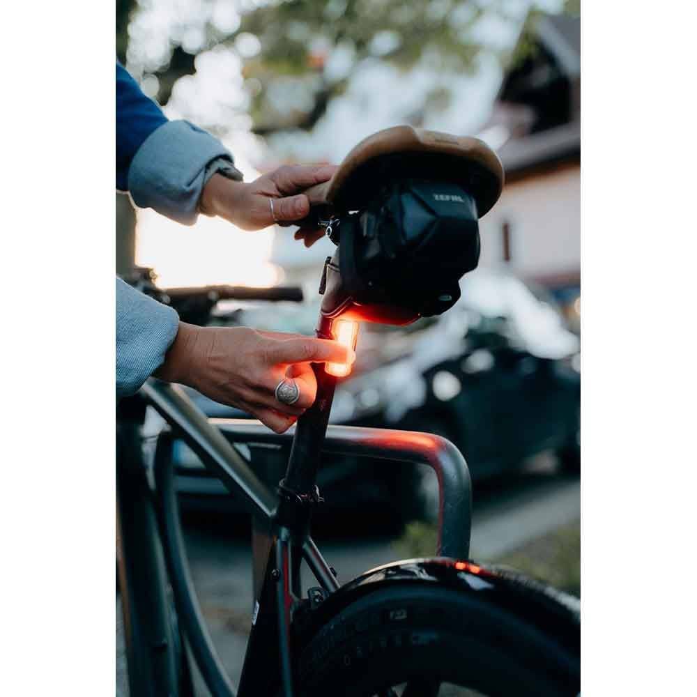 Zefal Vision R20 rear bike light with USB-C recharge, 4 modes, waterproof IPX6, mounted on bike for visibility and safety.