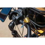 Zefal Classic Brass Bike Bell with loud sound and easy install, mounted on a bicycle handlebar for safety and style.