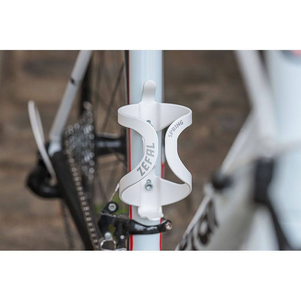 Zefal Spring Bottle Cage for cycling, lightweight and durable water bottle holder mounted on bike frame.