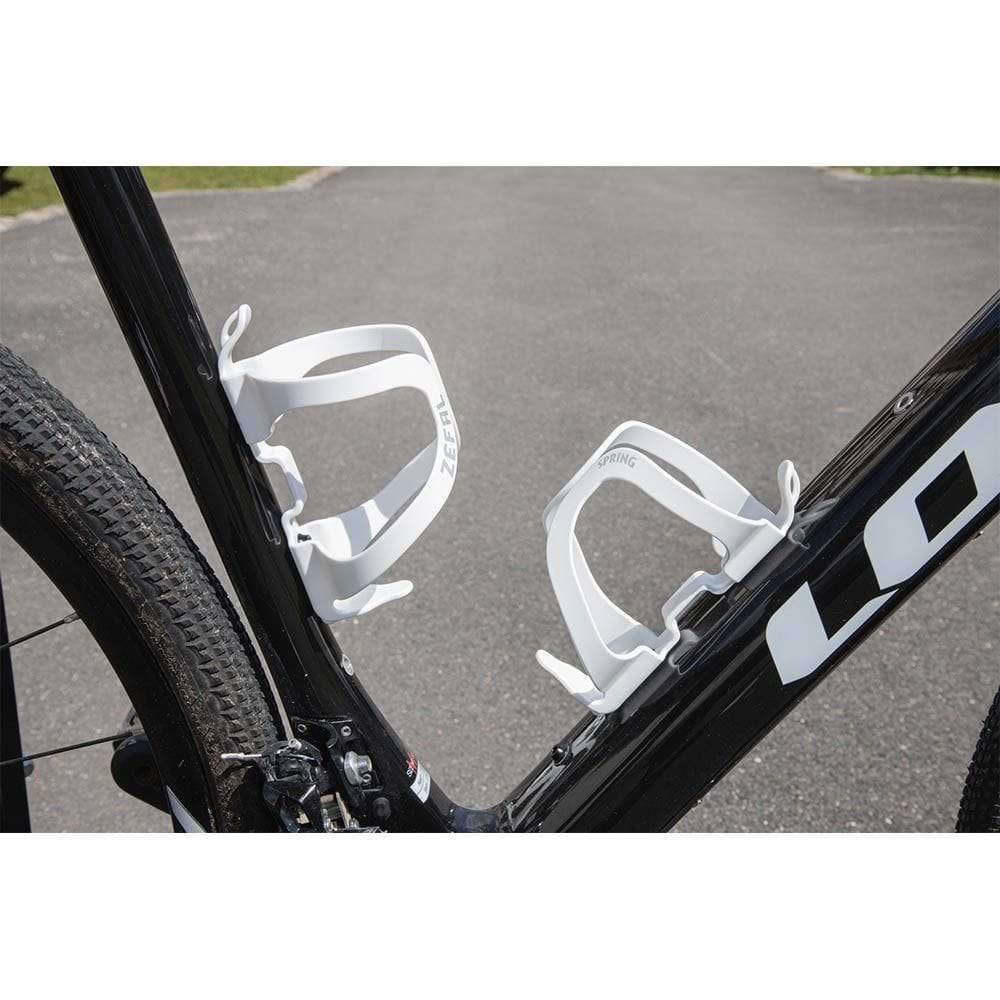 Zefal Spring bottle cage mounted on a bicycle frame, lightweight and durable cycling water bottle holder for easy hydration.