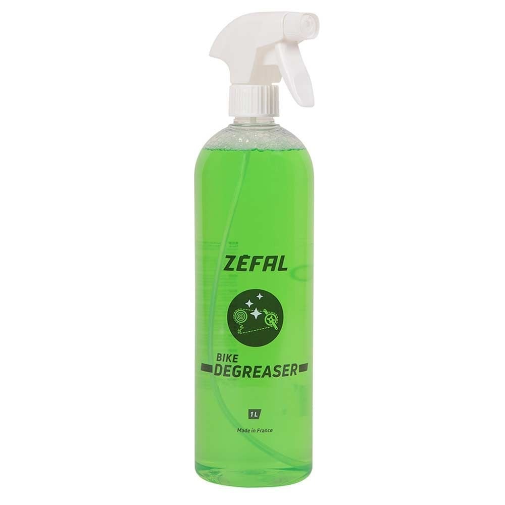 Zefal Bio Degreaser spray in workshop setting, eco-friendly cleaner for bike mechanical parts, shown in a workshop environment.