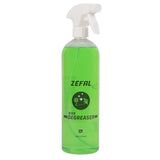 Zefal Bio Degreaser spray in workshop setting, eco-friendly cleaner for bike mechanical parts, shown in a workshop environment.