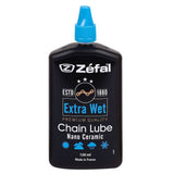 Zefal Extra Wet Ceramic Bike Chain Lubricant bottle for all weather conditions on a workshop surface