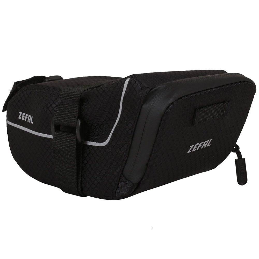 Zefal Z Light saddle pack with reflective stripes and light mount attached to a bike seat for storage and visibility.