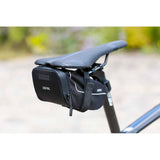 Zefal Z Light saddle pack with reflective stripes and light mount for bike seat storage, designed for cycling accessories.