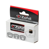 Zefal 16g threaded CO2 cartridge for bike tire inflation, shown with mounting accessories and spare cartridges.