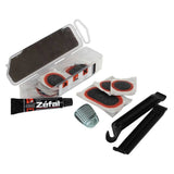Zefal universal bicycle puncture repair kit with patches, cement, and grater for bike workshop use