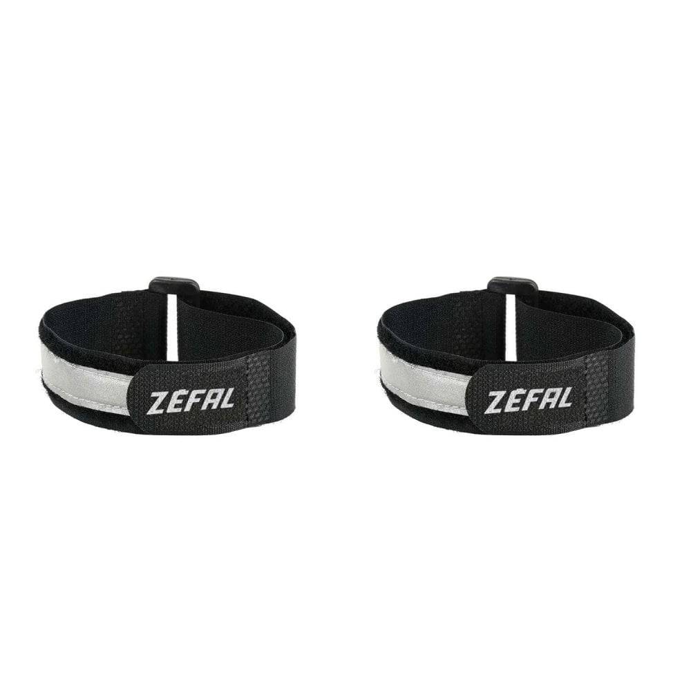 Zefal Doowah long trouser straps with reflective tape for visibility and security, attached to black clothing for cycling safety.