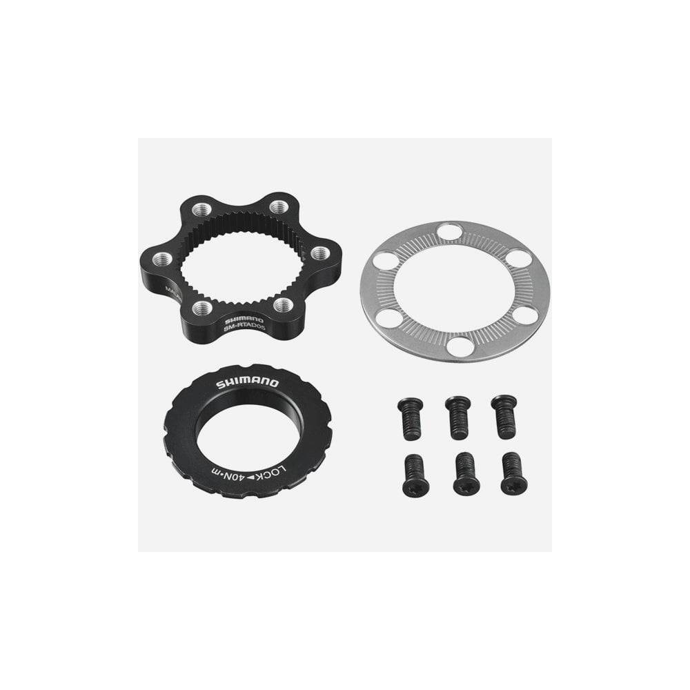 Shimano SM-RTAD05 6-bolt rotor to center-lock hub disc brake adapter for bike components, black and metal finish.