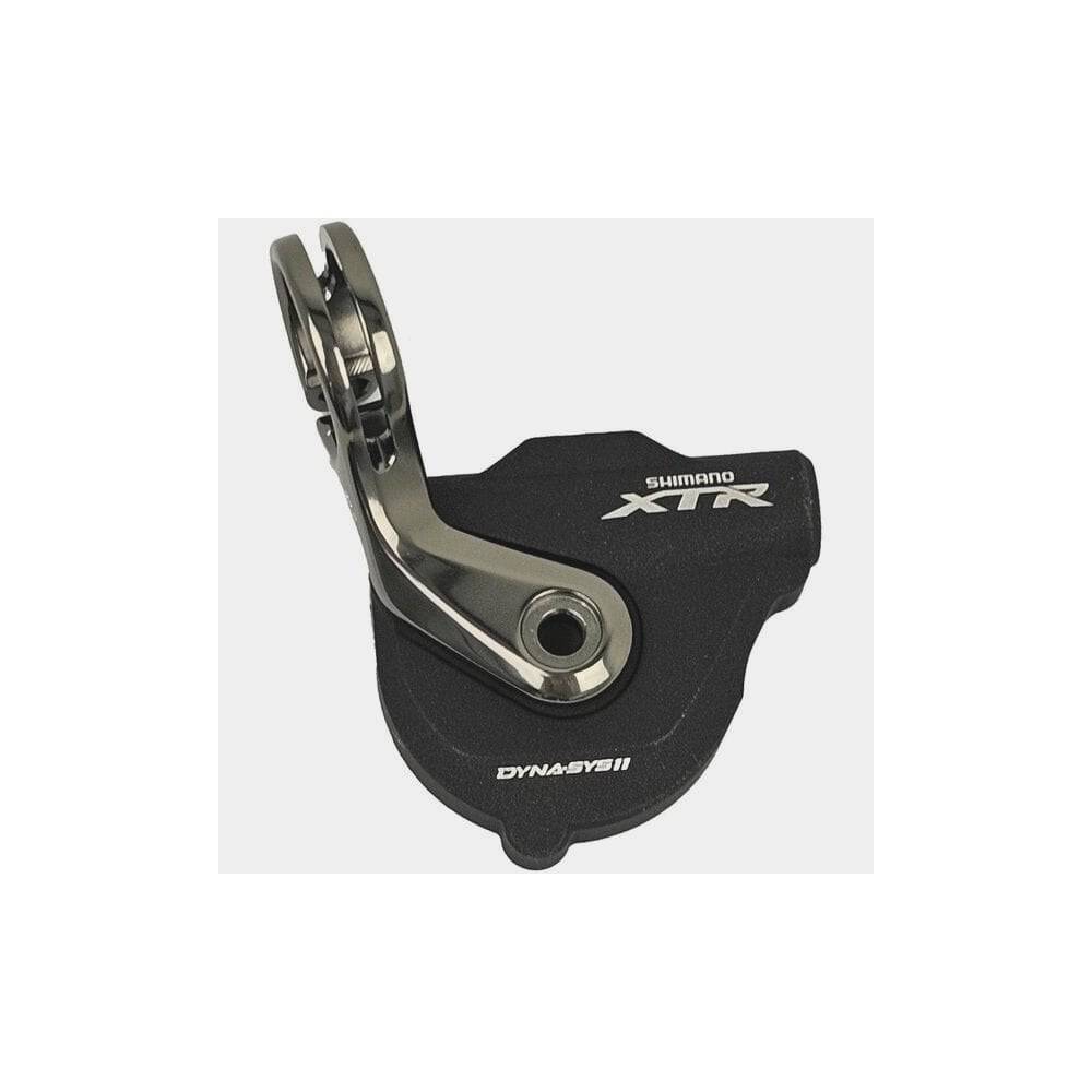 Shimano SL-M9000 right hand shifter cover replacement showing close-up of black plastic component for bike gear shifting.