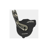 Shimano SL-M9000 right hand shifter cover replacement showing close-up of black plastic component for bike gear shifting.