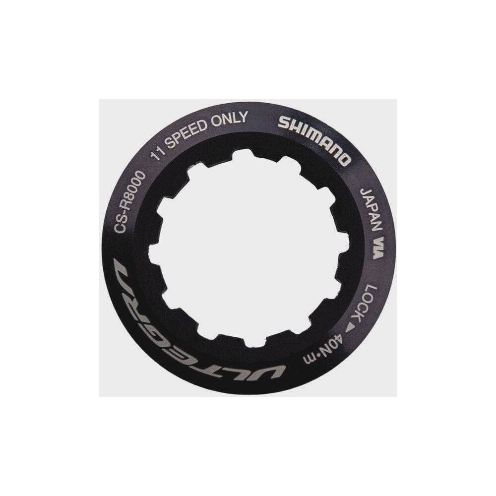 Shimano CS-R8000 lock ring and spacer for road bike drivetrain, genuine spare component for Shimano cycling bikes.