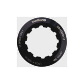 Shimano Spares lock ring and spacer for CS-HG800-11 crankset, maintenance components, silver metal parts on a white background.