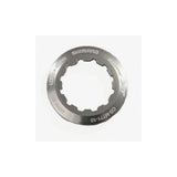 Shimano CS-M771 lock ring and spacer for secure cassette installation on bicycle wheel hub components.