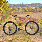 Surly Bridge Club 27.5 bike frame for touring and multi-surface riding, shown in a natural setting with detailed frame features