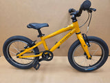 Ridgeback Kids Dimension 16-inch children's bike with black frame and colorful accents, designed for young riders.
