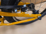 Ridgeback Kids Dimension 16-inch bike for children, ex-demo model, with colorful frame and training wheels.