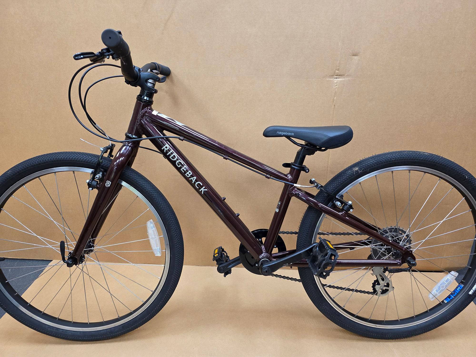 Ridgeback Kids Dimension 24-inch children's bicycle, blue and black frame, ready for riding, ex-demo bike for kids.