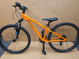 Ridgeback Kids MX26 26-inch children's bike with sturdy frame and colorful design, suitable for young riders outdoors.