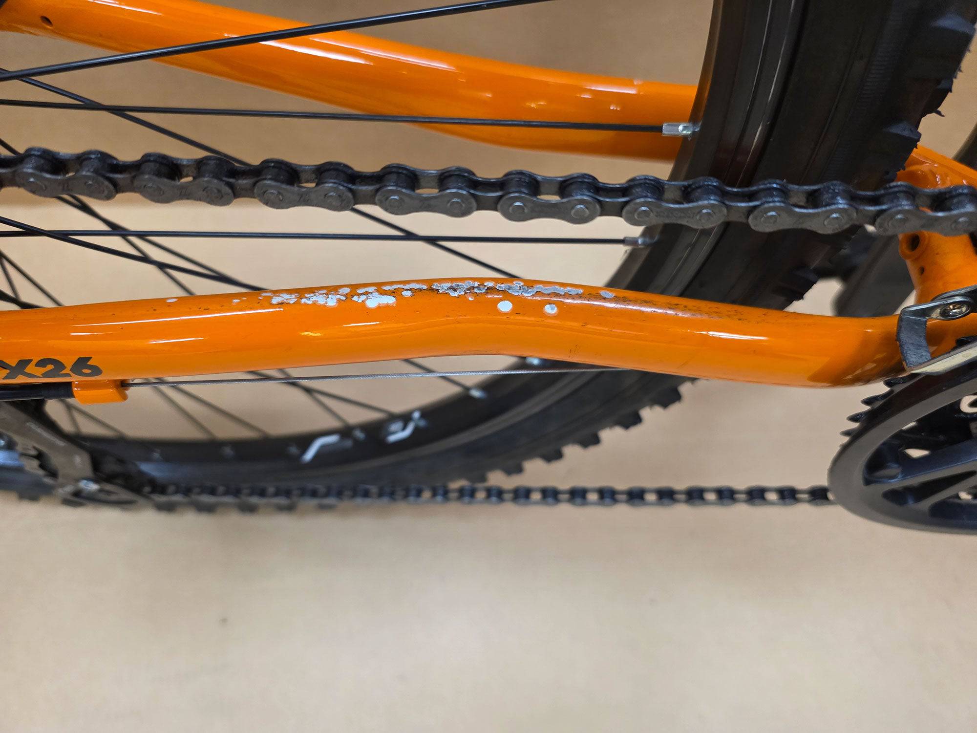 Ridgeback Kids MX26 demo bike with a durable 26-inch children's bicycle frame, ready for young riders.