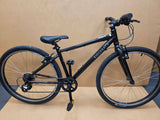 Ridgeback Kids Dimension 26 grey bike for young riders, featuring a sturdy frame and reliable design, suitable for children.