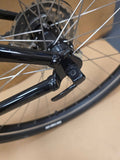 Grey Ridgeback Kids Dimension 26 bike for young riders, featuring a durable frame and reliable design, shown in a close-up view.