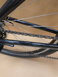Ridgeback Kids Dimension 26 grey bike for children, showing a durable bicycle designed for young riders with sturdy frame and wheels.