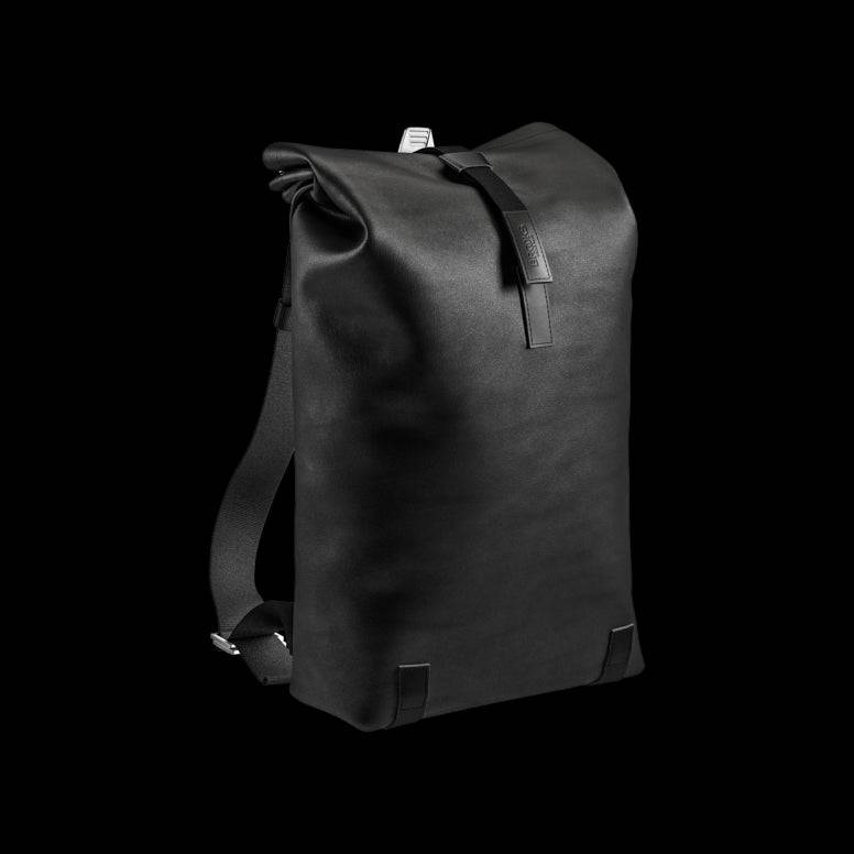 Brooks Pickwick roll-top backpack with laptop sleeve, designed for urban cycling and commuting, featuring durable accessories and stylish design.