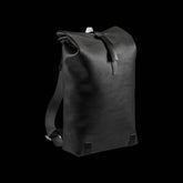 Brooks Pickwick roll-top backpack with laptop sleeve, designed for urban cycling and commuting, featuring durable accessories and stylish design.