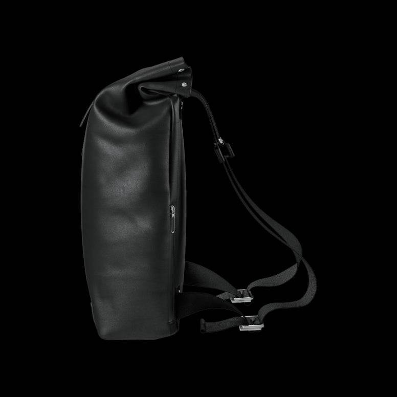 Brooks Pickwick roll-top backpack with laptop sleeve, ideal for urban cycling and commuting, featuring durable accessories and adjustable straps.