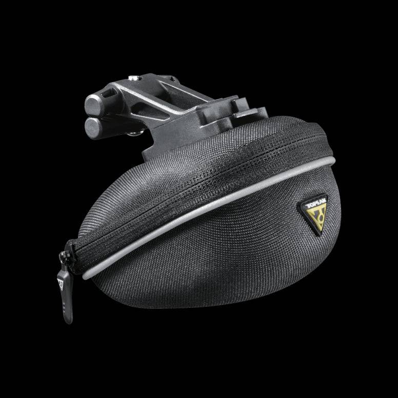 Topeak Propack lightweight bike seat pack with quick release and reflective piping, designed for cycling accessories storage.