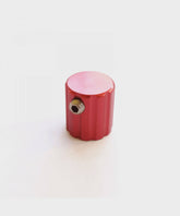 Fox Fork 32 Rebound Adjuster component for suspension, showing the extruded metal part designed for performance and control.