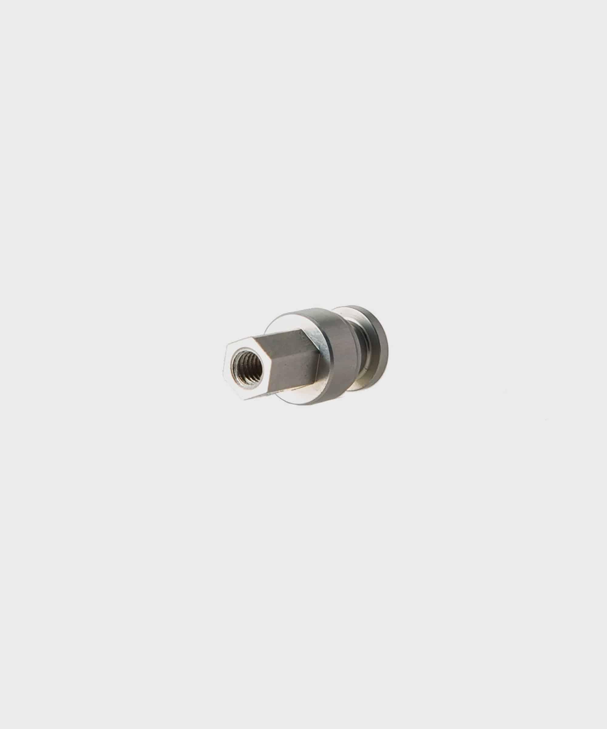 Fox Factory Series Grip LSC damping coupler for fork suspension control, shown in a close-up of the component.
