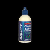 Squirt Maintenance Chain Lube by Squirt, eco-friendly bicycle chain lubricant in a workshop setting, showing the lubricant bottle.