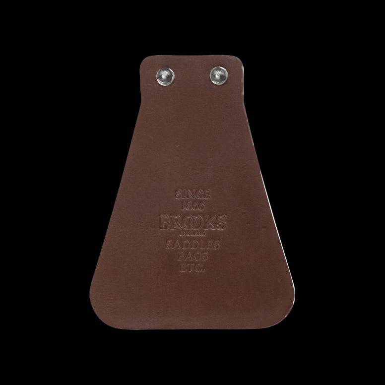 Brooks leather bike mudflap with screws featuring a classic 1937 design, mounted on a bicycle for vintage style and protection.