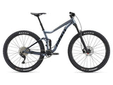 Giant Stance 29 2 2026 full suspension mountain bike with disc brakes, black frame and rugged tires for off-road riding.