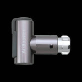 Topeak AirBooster Compact CO2 inflator for Presta and Schrader valves with dust cap, shown with nozzle and valve adapters.