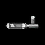 Topeak AirBooster Compact CO2 inflator for Presta and Schrader valves with dust cap, shown with attached valve connection.