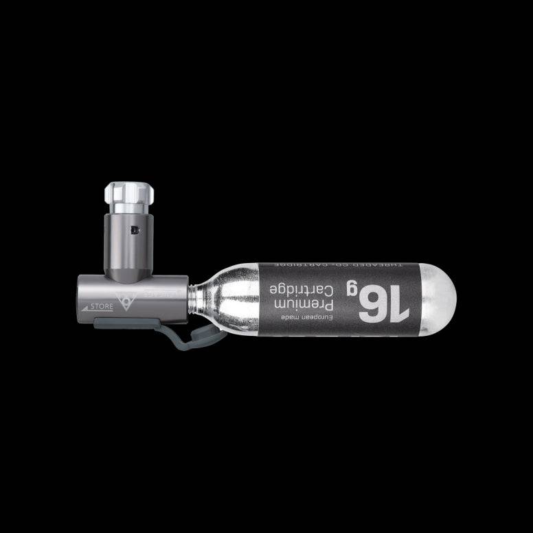 Topeak AirBooster compact CO2 inflator with dust cap, designed for Presta and Schrader valves, accessory for bike pumps.