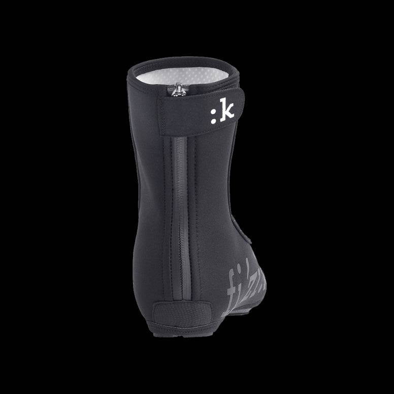 Fizik waterproof cycling overshoes with reflective details, designed to keep feet dry and visible during winter rides.