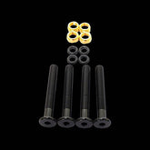 Orange Seal tubeless valve stems with lock nuts and O-rings, showing secure fit components for bike wheel sealing.