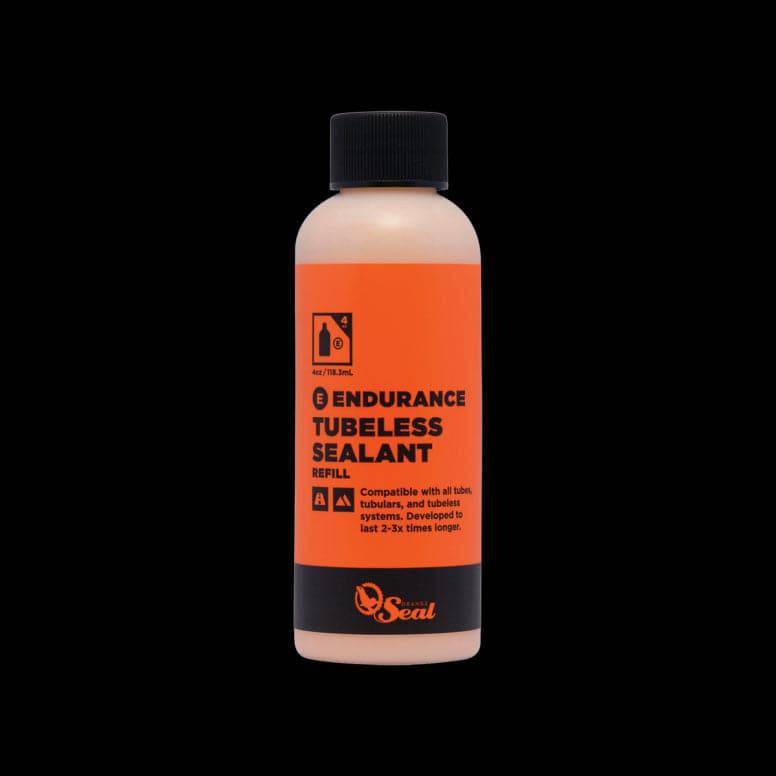 Orange Seal Endurance tubeless sealant for puncture protection, shown in a container, suitable for cold weather cycling components.