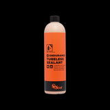 Orange Seal Endurance tubeless sealant in a container, designed for puncture protection and cold weather cycling applications.