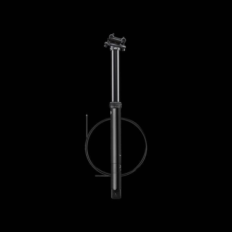 Crank Brothers Highline 7 dropper seatpost with hydraulic cartridge and quick-connect cable, mounted on a mountain bike frame.
