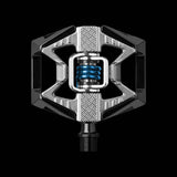 Crankbrothers Double Shot 2 hybrid MTB pedals in black and silver with adjustable cleats, sturdy mountain biking components.