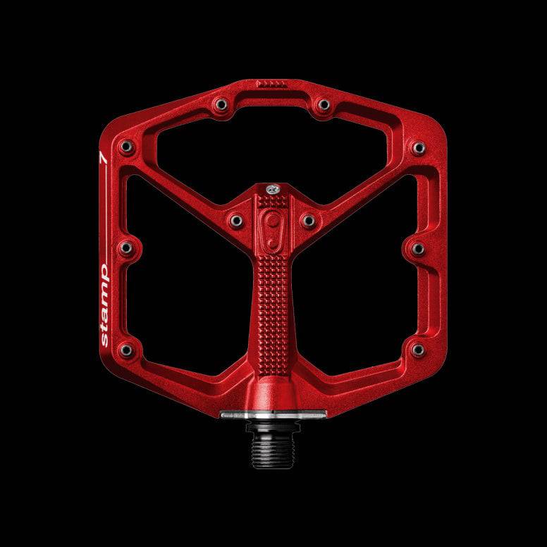 Crank Brothers Stamp 7 flat mountain bike pedal with adjustable pins, durable metal construction, and a wide platform for stability.