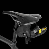Topeak Aero Wedge Strap Mount bike seat pack with pump holder and reflective strips, compact cycling accessories for storage.